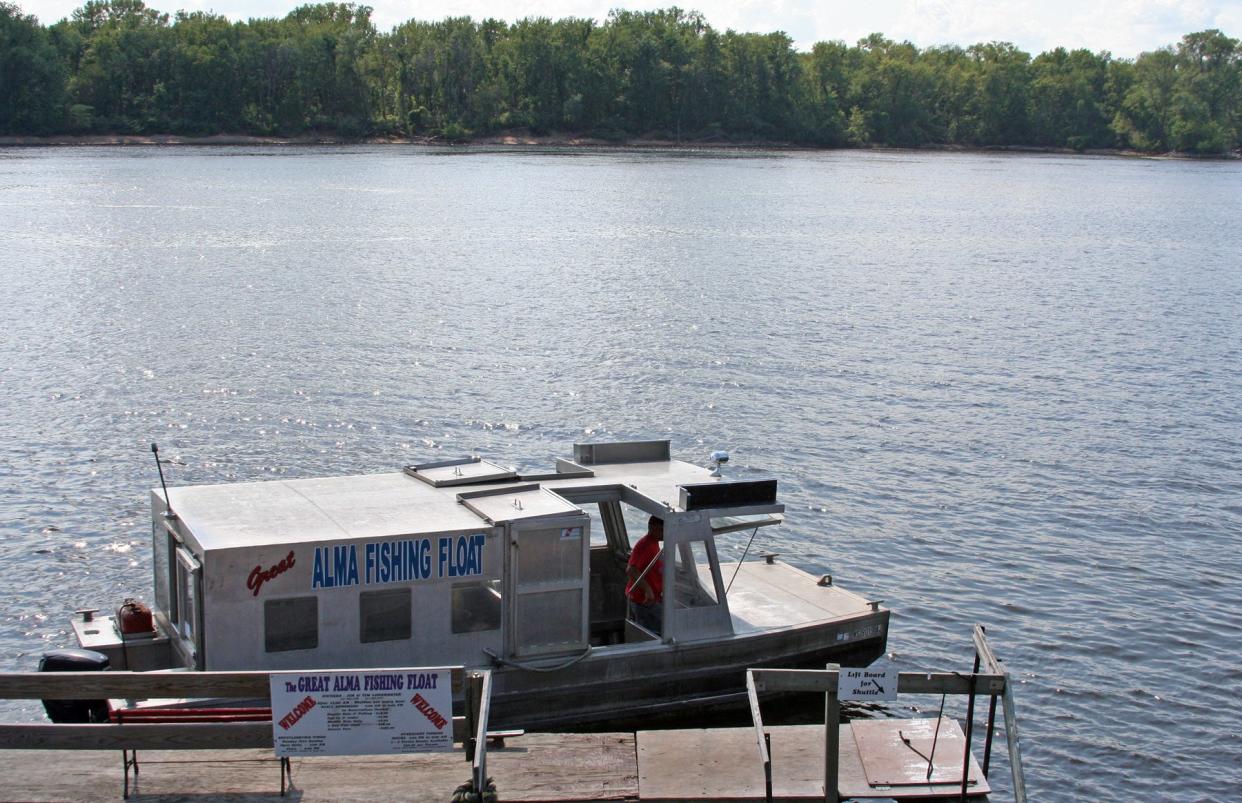 A shuttle boat waits to take visitors to the Great Alma Fishing Float.