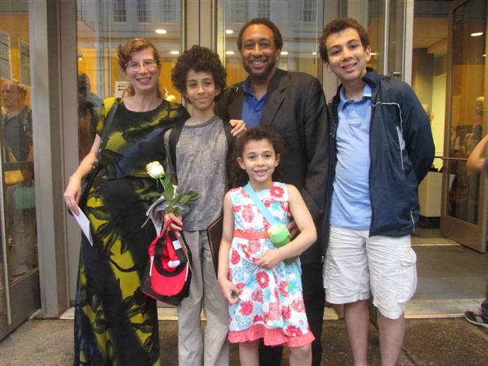 Alina Adams with her husband and three children, who have come to accept her no-gift Hanukkah tradition. (Courtesy Alina Adams)