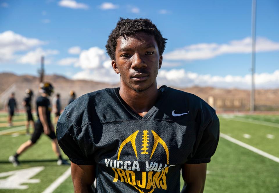 Malachi Harper poses for a photo during practice at Yucca Valley High School in Yucca Valley, Calif., Thursday, Aug. 10, 2023.