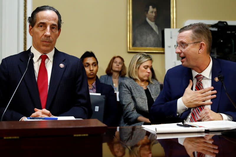 House Judiciary Committee ranking member Rep. Doug Collins, R-Ga., looks to Rep. Jamie Raskin, D-Md., as he speaks during a House Rules Committee hearing on the impeachment against President Donald Trump, in Washington