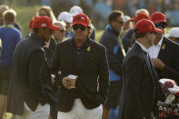 FILE - In this Sept. 30, 2018, file photo, Tiger Woods, left, and Phil Mickelson wait for the closing ceremony after Europe won the Ryder Cup on the final day of the 42nd Ryder Cup at Le Golf National in Saint-Quentin-en-Yvelines, outside Paris, France. They will go head-to-head in a $9 million match Friday in Las Vegas. (AP Photo/Matt Dunha, Filem)