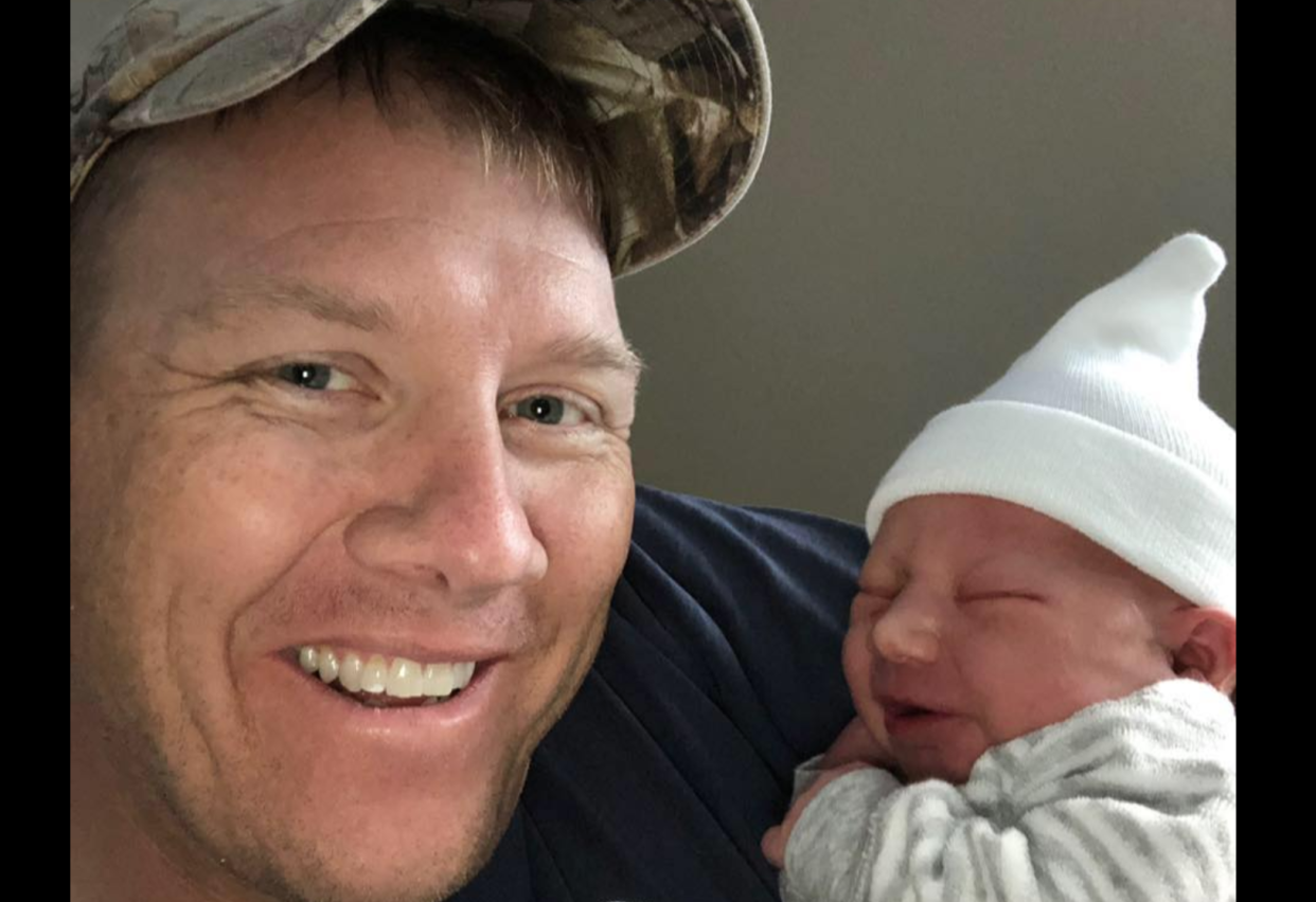 Rob Millerbernd helped his wife give birth to their son, Wyatt, in their car as they were rushing to the hospital. (Photo: Facebook)