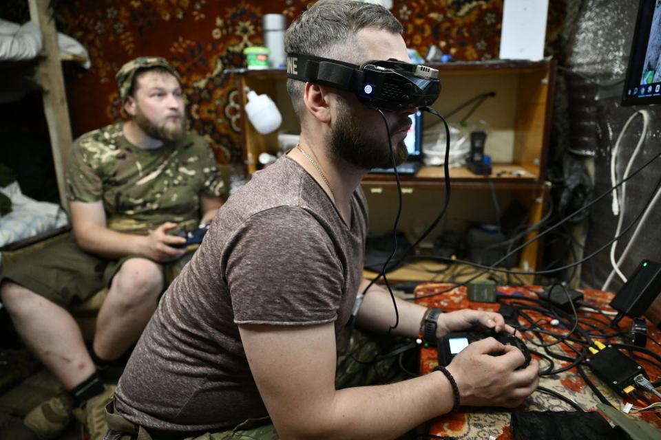 A Ukrainian soldier remotely controls an FPV drone in Dontesk, Ukraine (AFP via Getty Images)