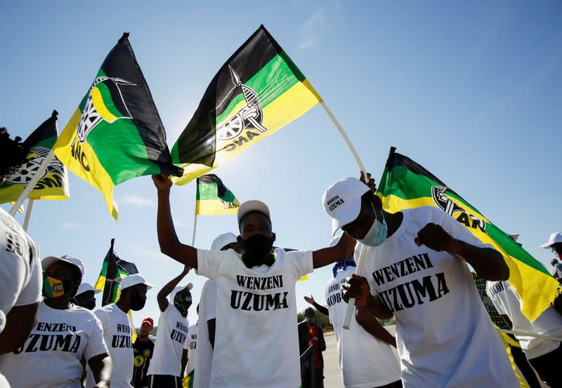 Supporters of former South African President Zuma sing and dance in front of his home following his sentencing, in Nkandla