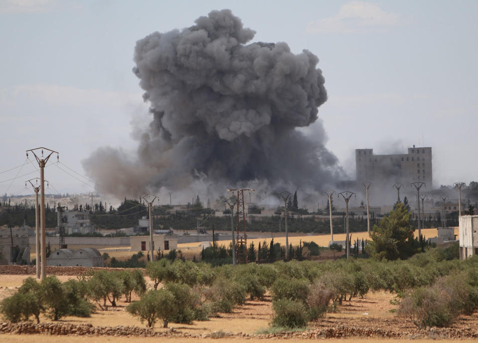 <p>Smoke rises after what fighters of the Syria Democratic Forces (SDF) said were U.S.-led air strikes on the mills of Manbij where Islamic State militants are positioned, in Aleppo Governorate, Syria June 16, 2016. (REUTERS/Rodi Said) </p>