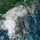 In this image provided by NOAA, Tropical Storm Gordon approaches the United States on Tuesday, Sept. 4, 2018. Coastal residents from Florida to Louisiana hustled to prepare for a deluge as Tropical Storm Gordon grew stronger on a path to hit the central U.S. Gulf Coast as a hurricane Tuesday night. (NOAA via AP)