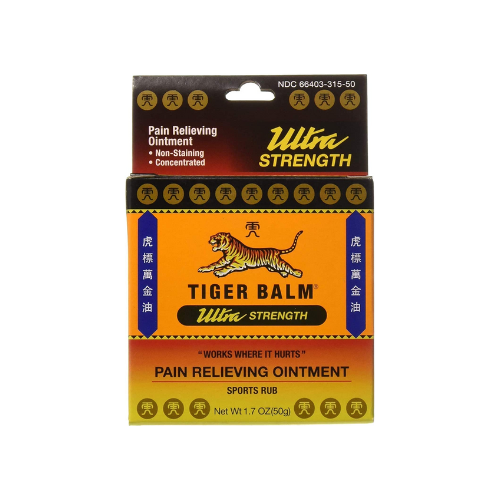 Tiger Balm pain relieving cream against white background