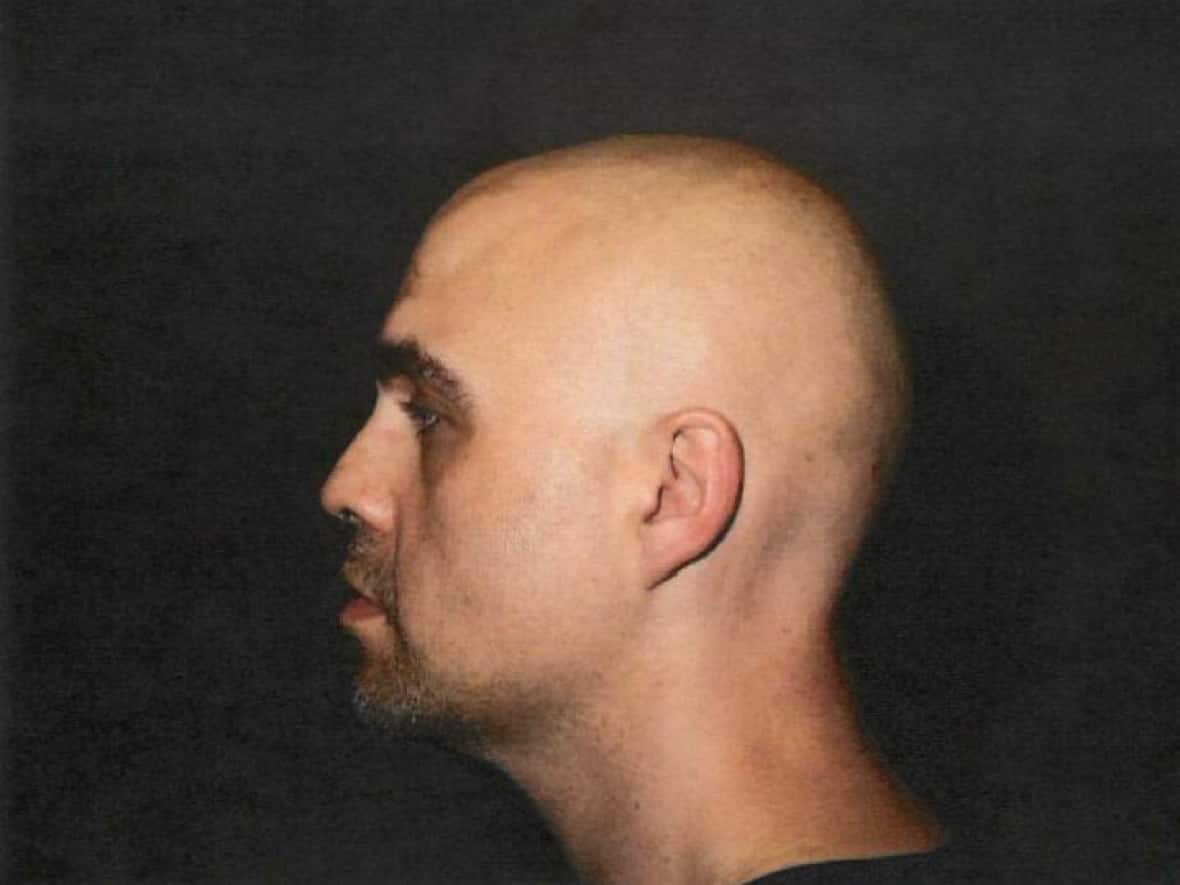 Court heard Tuesday about how Jeremy Skibicki, shown here in a police photograph taken while in custody, searched for the definition of a serial killer on the internet. (Manitoba Court of King's Bench - image credit)