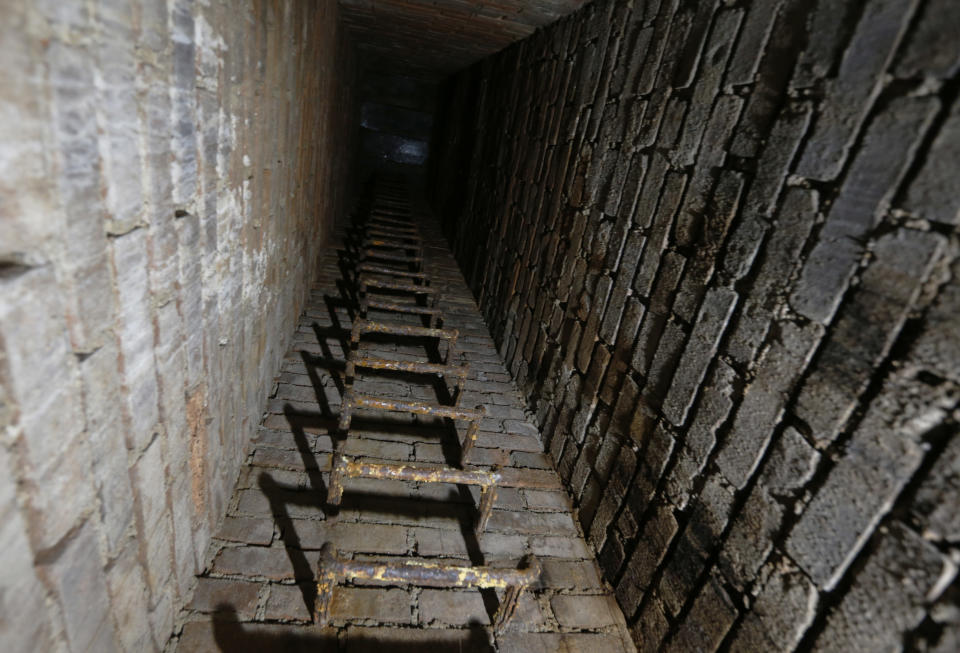 An escape staircase at the nuclear shelter from Cold War era is pictured at five star Jalta Hotel in downtown Prague, Czech Republic, Wednesday, Dec. 4, 2013. To mark the 55th anniversary, the hotel began to turn the bunker into an Iron Curtain museum whose first part was opened to the public in Nov. 2013. (AP Photo/Petr David Josek)
