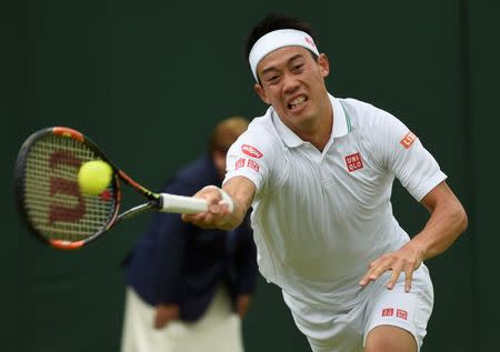 Britain Tennis - Wimbledon - All England Lawn Tennis & Croquet Club, Wimbledon, England - 2/7/16 Japan's Kei Nishikori in action against Russia's Andrey Kuznetsov REUTERS/Toby Melville