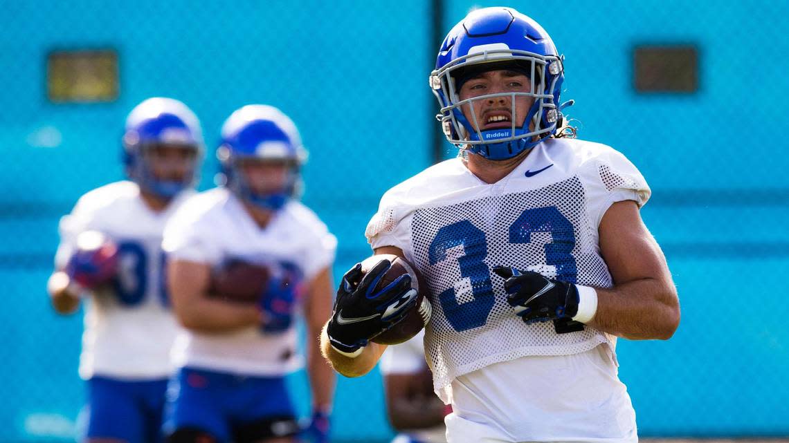 Boise State running back Tyler Crowe runs drills on the first day of fall camp, Wednesday, Aug. 3, 2022.