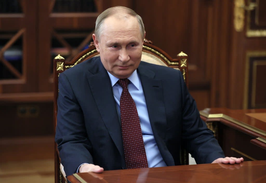 Russian President Vladimir Putin attends a meeting at the Kremlin in Moscow, 2 March 2022 (SPUTNIK/AFP via Getty Images)