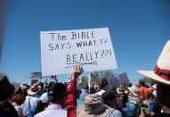 <p>People participate in a protest against a recent U.S. immigration policy of separating children from their families when they enter the United States as undocumented immigrants, outside the Tornillo Tranit Center, in Tornillo, Texas, June 17, 2018. (Photo: Monica Lozano/Reuters) </p>