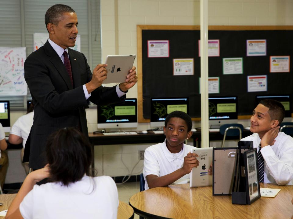 Obama records students on an iPad in 2014