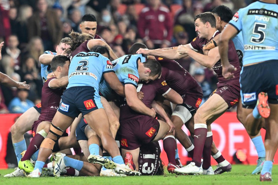 Matt Burton and Dane Gagai, pictured here sparking an all-in melee in State of Origin III.