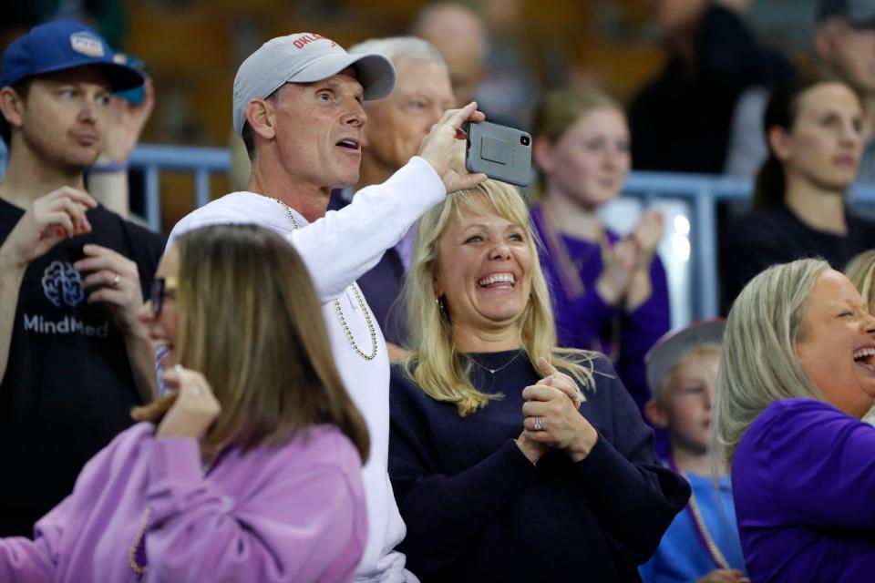 Oklahoma football coach Brent Venables and his wife, Julie, watch as their daughter, Laney Venables, is introduced before playing in a Class 3A girls state basketball game between Community Christian and Roland at State Fair Arena in Oklahoma City, Tuesday, March 5, 2024.