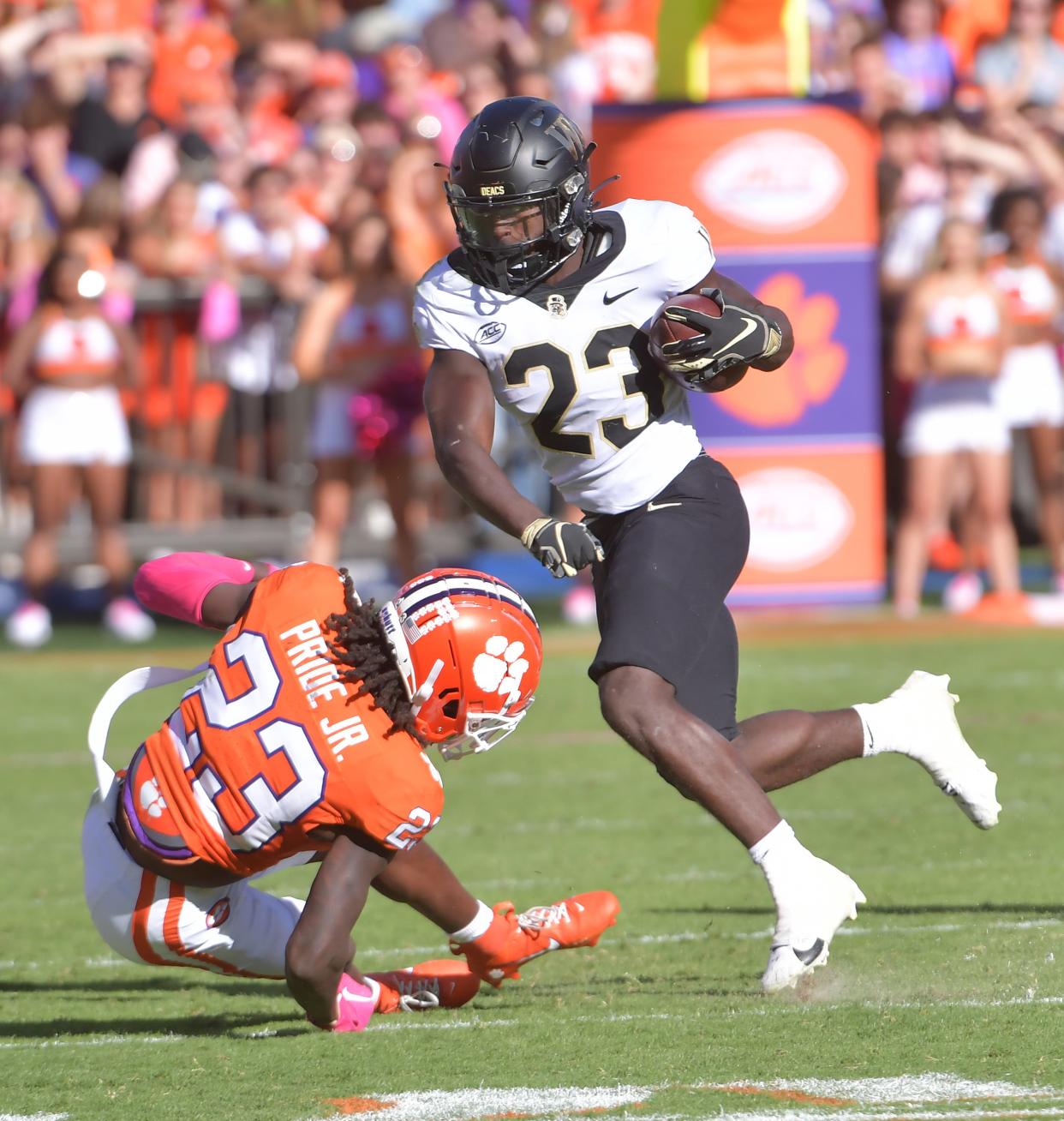 The Clemson Tigers played the Wake Forest Demon Deacons at Memorial Stadium in Clemson, South Carolina, on Saturday, October 7, 2023. Clemson cornerback Toriano Pride Jr. (23) tries to take down Wake Forest running back Demond Claiborne (23) on a play.