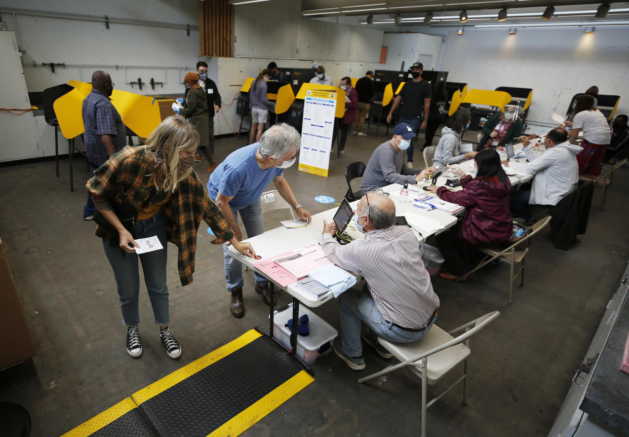 Voters cast their ballots at a vote center at Santa Monica College.