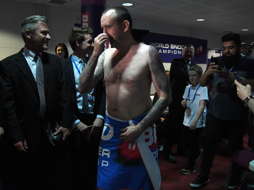 Mark Williams enters the media centre (Rex)