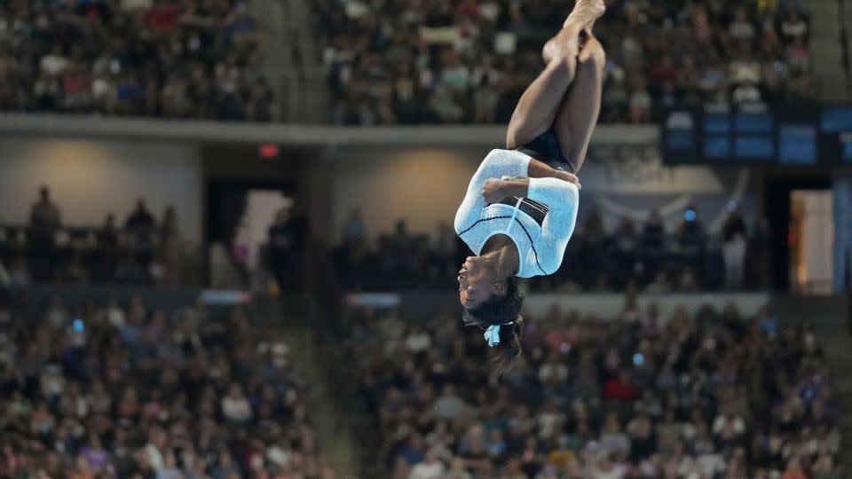 Simone Biles performs in the floor exercise on Saturday in Hoffman Estates, Illinois. - Erin Hooley/AP