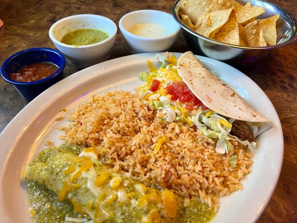 A Campo Verde combo plate with the new green sauce and also the new white cheddar queso (top).