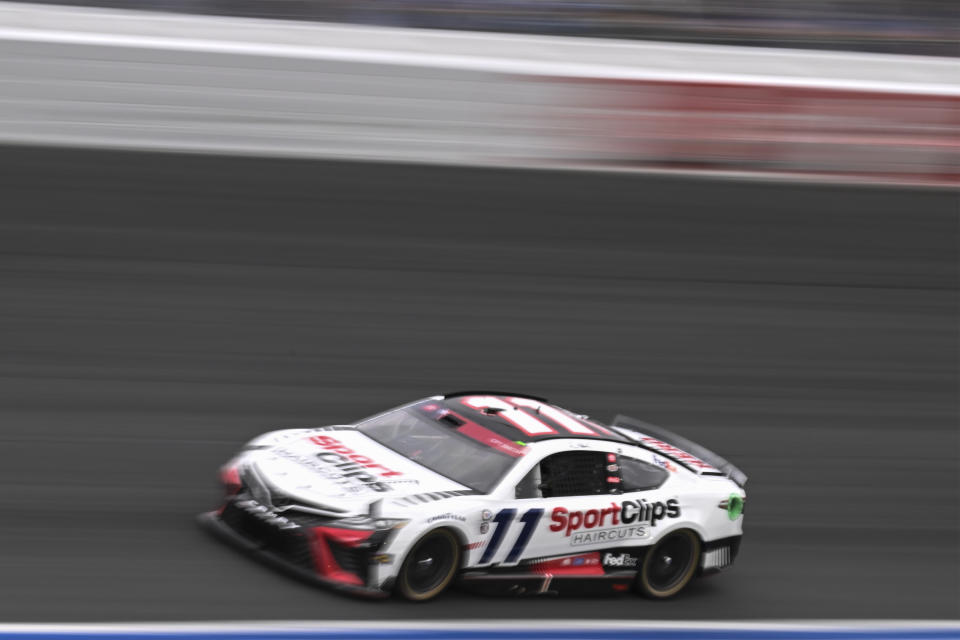 Denny Hamlin (11) competes during a NASCAR Cup Series auto race at Charlotte Motor Speedway, Monday, May 29, 2023, in Concord, N.C. (AP Photo/Matt Kelley)