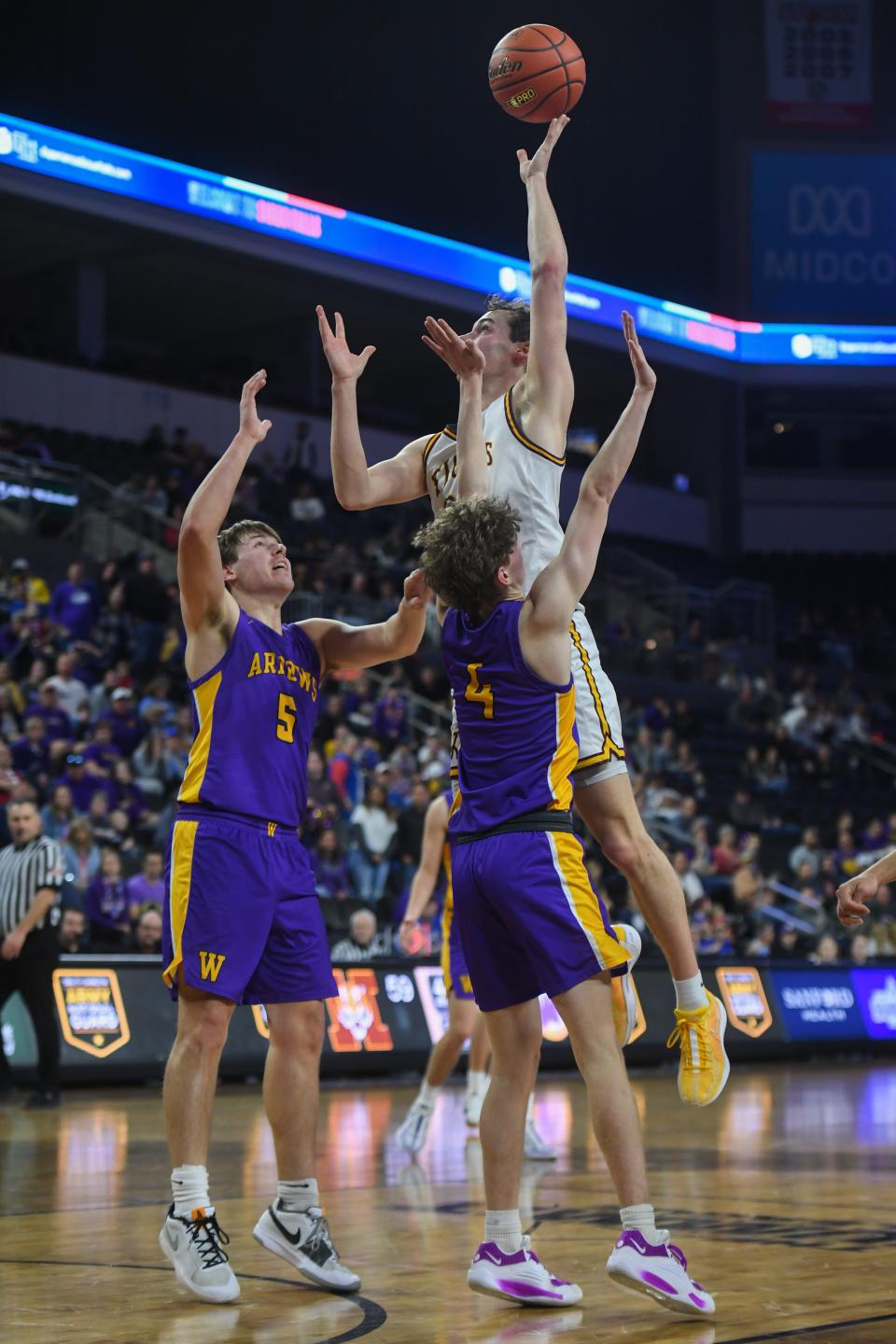 Harrisburg's guard Jacoby Mehrman (24) shoots the ball on Thursday, March 14, 2024 at Denny Sanford Premier Center in Sioux Falls.