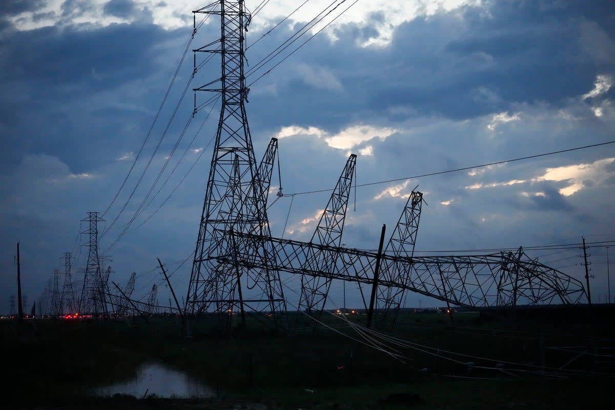 Transmission power lines are down near the Grand Parkway and West Road after a storm   (AP)