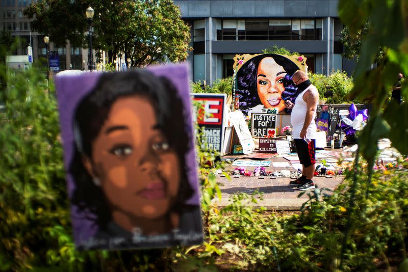 People react after a decision in the criminal case against police officers involved in the death of Breonna Taylor, in Louisville