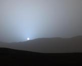 <p>Have you ever seen a sunset so awe-inspiring that it brings a tear to your eye? This may not seem like one of those at first glance, but perhaps the knowledge that it's actually happening on Mars (captured by the Mars Rover Spirit) millions of miles from Earth might change your tune. </p>