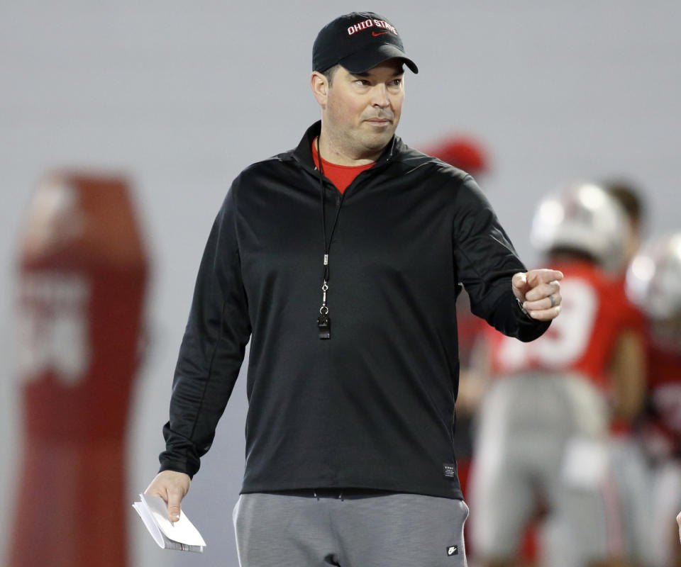 FILE - In this March 6, 2019, file photo, Ohio State University football coach Ryan Day gestures during an NCAA college football practice in Columbus, Ohio. Ohio State on Friday, March 19, 2021, opened what Day hopes will be an uninterrupted spring practice as he seeks a new starting quarterback and some normalcy after a tumultuous 2020. (AP Photo/Paul Vernon, File)