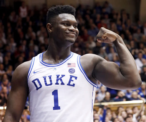 Duke’s Zion Williamson (1) celebrates after he scored against North Carolina State during the second half of an NCAA college basketball game in Durham, N.C., Saturday, Feb. 16, 2019. (AP Photo/Chris Seward)