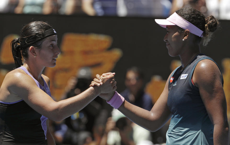 Japan's Naomi Osaka, right, is congratulated by Latvia's Anastasija Sevastova after winning their fourth round match at the Australian Open tennis championships in Melbourne, Australia, Monday, Jan. 21, 2019. (AP Photo/Mark Schiefelbein)