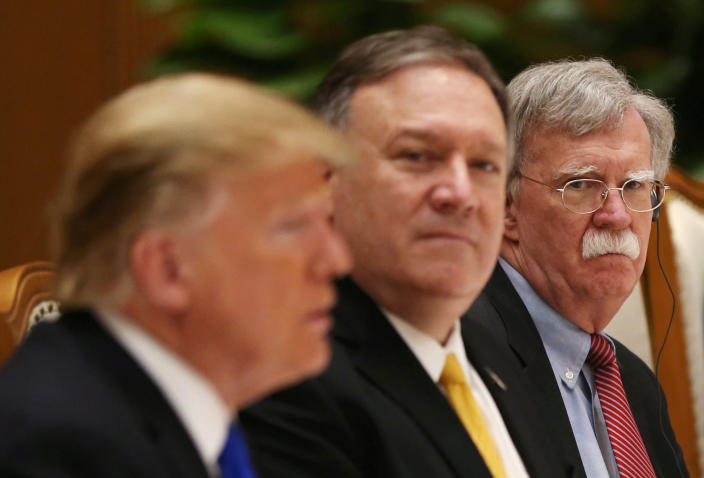 John Bolton (right) attends a working lunch alongside President Trump (left) and Secretary of State Mike Pompeo (center) in Hanoi, Vietnam, Feb. 27, 2019. (Leah Millis/Reuters)