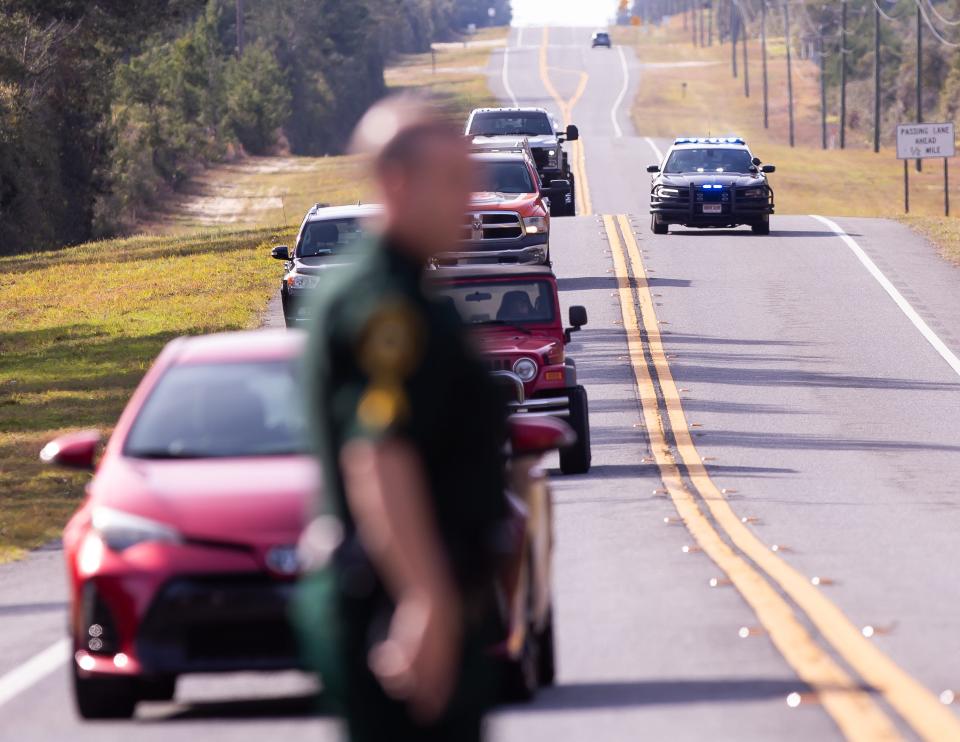 Traffic is stopped on State Road 40 following a fatal crash on Feb. 1 between a stolen deputy's vehicle and a pickup truck.