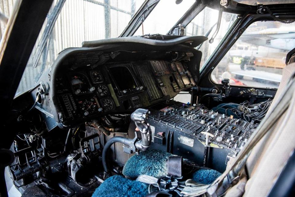 The cockpit of a SH-60B Seahawk helicopter inside Castle Air Museum’s restoration hanger in Atwater, Calif., on Wednesday, Jan. 12, 2022. According to Castle Air Museum Chief Executive Director Joe Pruzzo, the museum acquired a Bell AH-1W Cobra attack helicopter and the SH-60B Seahawk helicopter from Hawaii in 2021. When ready, the aircraft will be displayed on the Castle Air Museum grounds along with dozens of other vintage aircraft.