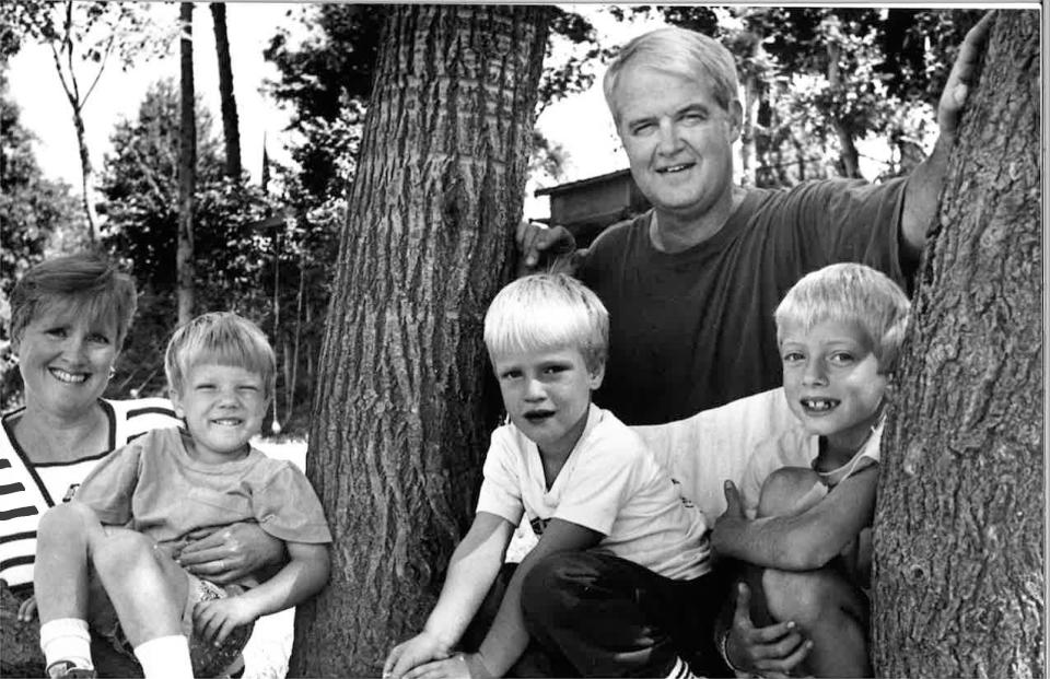 Peter Courtney and his wife, Margie, with their three sons, left to right, Adam, Sean and Peter.