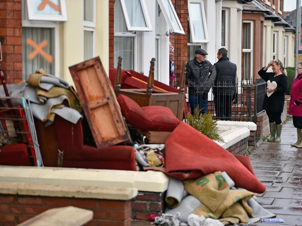 Residents start to empty their possessions from their homes after Storm Desmond caused floodingJeff J Mitchell/Getty Images