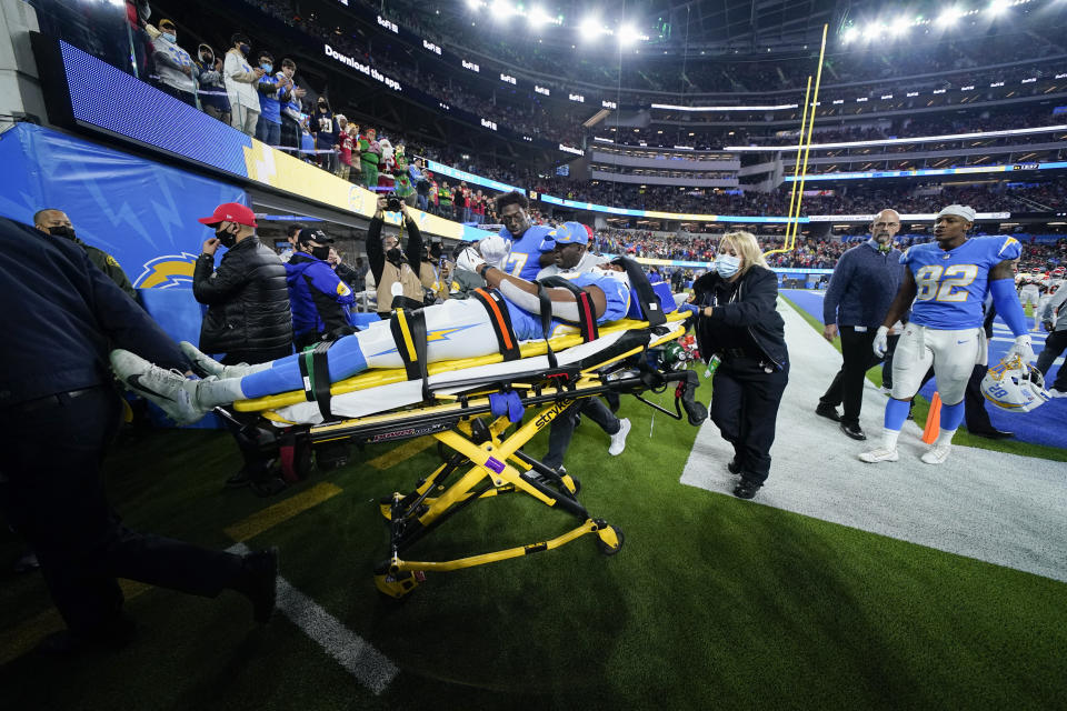 Los Angeles Chargers tight end Donald Parham leaves the field on a stretcher after an injury during the first half of an NFL football game against the Kansas City Chiefs, Thursday, Dec. 16, 2021, in Inglewood, Calif. (AP Photo/Ashley Landis)