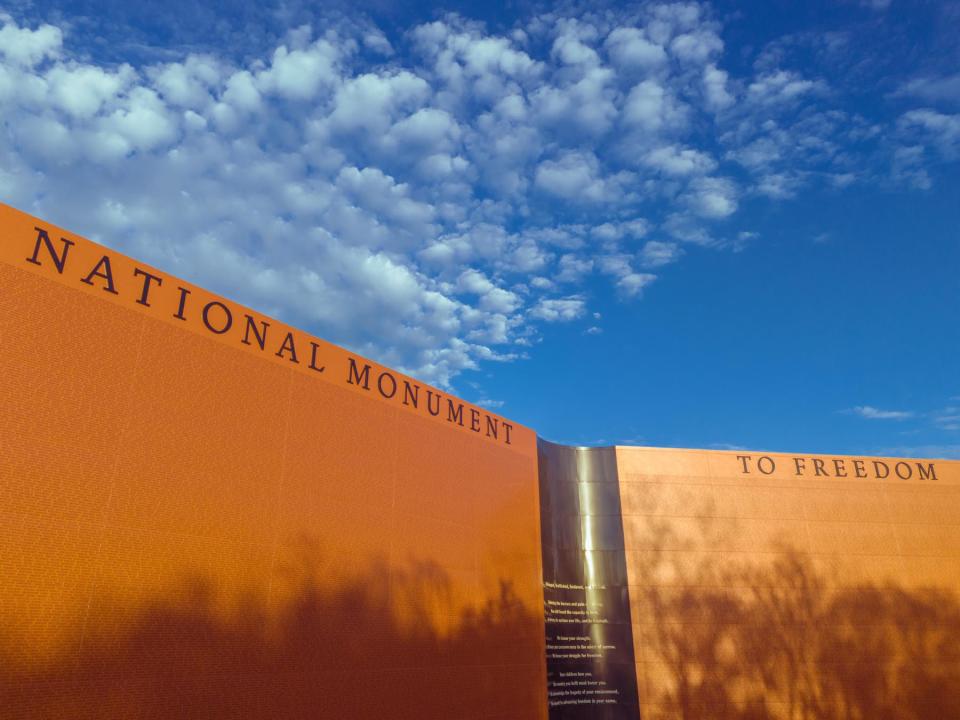 The final sculpture is the soaring National Monument to Freedom, which lists “over 122,000 surnames that nearly 5 million Black people adopted in 1870.”