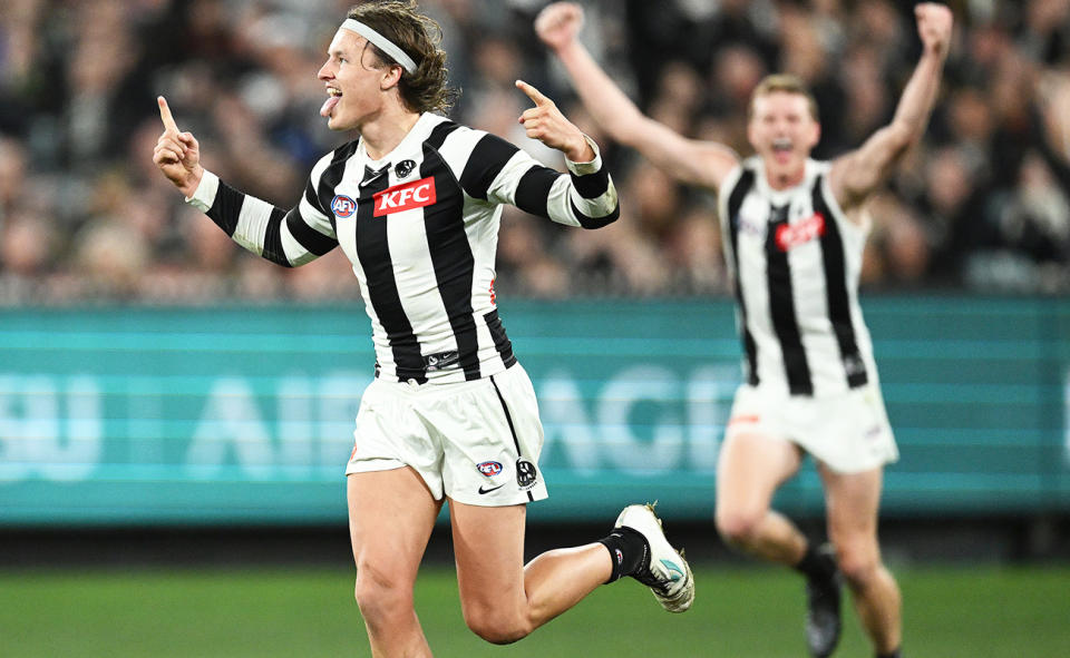 Jack Ginnivan, pictured here celebrating a goal for Collingwood against Essendon.