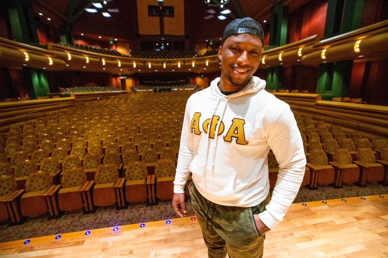 A doctoral student in the University of Notre Dame's sacred music program, Emorja Roberson poses for a portrait Tuesday, April 26, 2022, in the Leighton Concert Hall at DeBartolo Performing Arts Center, where his oratorio, "BE-SPOKEN," will be performed April 30, 2022.