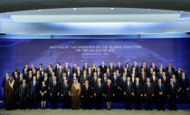 Delegates pose for the family photo with leaders from Global Coalition working to Defeat ISIS at the State Department in Washington, U.S., March 22, 2017. REUTERS/Joshua Roberts