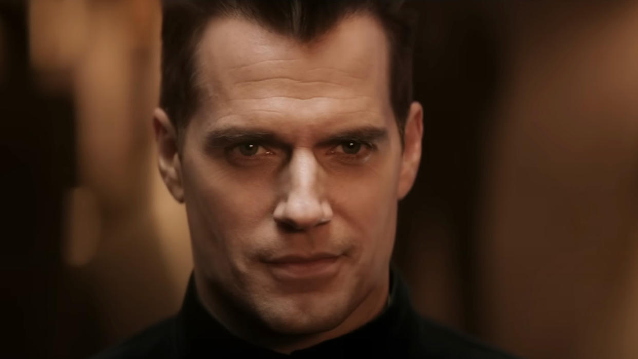  Henry Cavill wearing a smirk on his face in Argylle. 