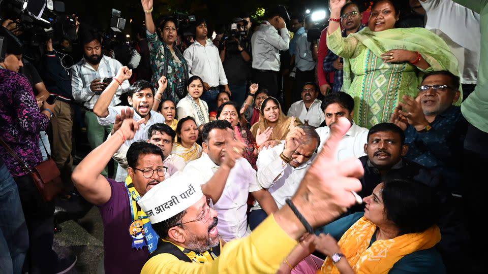 Aam Aadmi Party supporters protest as Enforcement Directorate personnel arrive to arrest their leader Arvind Kejriwal at his home in New Delhi, India, on March 21, 2024. - AP