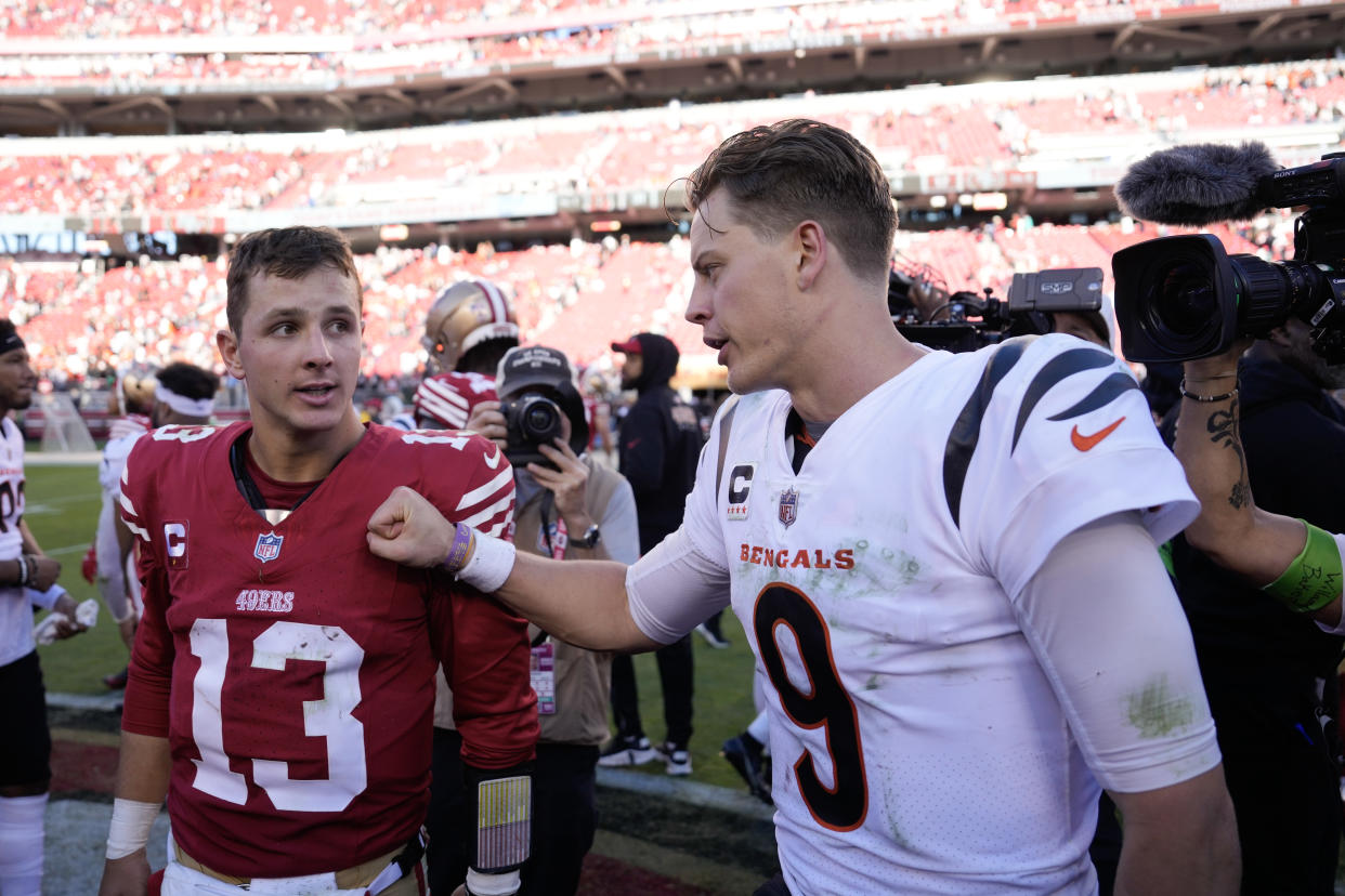 SANTA CLARA, CALIFORNIA - OCTOBER 29: Brock Purdy #13 of the San Francisco 49ers talks with Joe Burrow #9 of the Cincinnati Bengals after the game at Levi's Stadium on October 29, 2023 in Santa Clara, California. (Photo by Thearon W. Henderson/Getty Images)