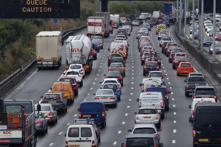 Motorists are facing traffic chaos as millions hit the road for the great summer getaway.Drivers have been warned to expect delays as millions of people start journeys amid rail closures, blocked motorways and airport strike warnings.Motorists on the M5 face severe delays following an oil spillage, which has resulted in slow-moving traffic along the motorway.Highways England said there were delays of around 90 minutes nortbound between Junctions 18 at Bristol and Junction 26 at Taunton. Officials said a speed restriction of 50mph had also been put in place between Wellington and Bridgwater South. > Severe delays on the M5 northbound this afternoon, at least 90 minutes additional travel time on the stretch between J26 Taunton and J18 Bristol. Any incidents will be posted on this feed, at present believed to be due to heavy rain and weight of traffic. pic.twitter.com/85XbOO1EP1> > — Highways England (@HighwaysSWEST) > > July 19, 2019A broken down vehicle also caused delays between Junction 5 and 6 of the motoway.Elsewhere, there are already lengthy tailbacks on the M25, with officials warning drivers to expect severe delays due to "high volumes of traffic". The queues, reported earlier to be up to nine miles long, built up anticlockwise on Friday afternoon after a lorry broke down before one of the tunnels at the junction of J1A A282 (Swanscombe).> It prompted major tailbacks of up to three hours as far back as Junction 4, according to drivers.Highways England added that there had been another collision between a car and a lorry at the A2 interchange which was also causing delays. > Some planned overnight closures in the region tonight: > > Dartford Crossing east (high) tunnel 11pm-5amM4 J4B to J4 eastbound 11pm-6amM20 J1 to J3 eastbound 11pm-6amM11 to J6 to J4 southbound 11pm-6am > > All of tonight's closures at https://t.co/7TjDa7WYcKweareworkingforyou pic.twitter.com/TbgM3OXmqK> > — Highways England (@HighwaysSEAST) > > 19 July 2019> UPDATE - M25 J4 - Dartford Tunnel (Anticlockwise): Slow moving traffic between J4 (Orpington) and the Dartford Tunnel due to high volumes of traffic. Expect delays: https://t.co/Uki9kPow53> > — KCC Highways (@KentHighways) > > 19 July 2019It said that emergency services have moved the obstruction onto the hard shoulder.TfL said the A406 North Circular Road has one lane blocked eastbound at the junction of Brentfield in Stonebridge Park after a collision. There are queues from before Hanger Lane.As well as the delays today, Highway England have also announced planned overnight closures on parts of the M4, M20 and M11.The M20 was hit earlier by delays following a vehicle and glass fire, but all three lanes have now reopened.It comes after The RAC and AA motoring organisations said millions more cars will take to the roads as many school terms end.> UPDATE - M20 J8-J9 Coast bound. 2 lanes of 3 now open between J8 (Leeds/A20) and J9 (Ashford/A251) due to a vehicle & grass fire. Emergency services in attendance. Expect delays on the approach: https://t.co/t9JHP3WjMG> > — KCC Highways (@KentHighways) > > 19 July 2019The RAC expects the busiest summer getaway on the roads for five years with more than 13 million leisure journeys planned this weekend.RAC research predicted today would be “Frantic Friday” with some 5.3 million separate getaways by car, which, added to the normal daily traffic, could mean it’s the worst day for congestion.Rail journeys will also be disrupted as a 16-day closure of a major junction on the West Coast Main Line begins on Saturday.Spokesman Rod Dennis said: “Saturday also looks busy with five million leisure trips planned followed by a further 3.4 million on Sunday.”Network Rail is carry out major upgrades of track, signalling and overhead lines at Acton Grange junction, which is located between Crewe and Preston.This means journeys between London Euston and Scotland will take longer, with rail replacement buses in use for some sections.It is also one of the busiest weekends of the year for travel companies, with many families jetting off on holiday as soon as school terms finish.