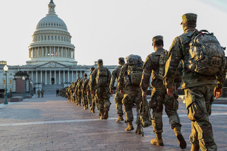 <p>Members of the U.S. National Guard arrive at the U.S. Capitol on January 12, 2021 in Washington, DC.</p>