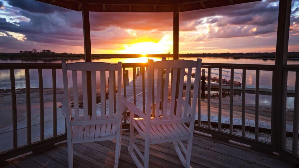 Two Rocking Chairs Overlooking Sunset