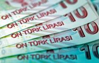 FILE PHOTO: Turkish 10 lira banknotes are seen in this illustration picture, January 28, 2014. REUTERS/Illustration/Murad Sezer/File Photo